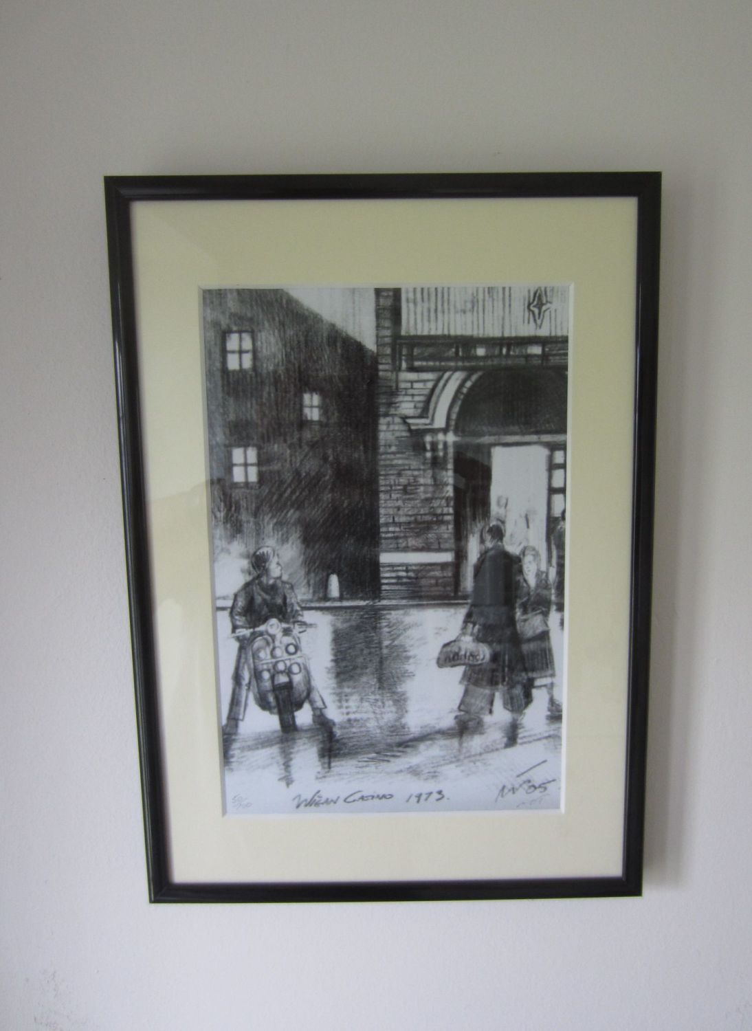 "Lambretta Outside Wigan Casino" - A4 size, mounted and framed. Overall size 30.5 cm tall by 22 cm wide.